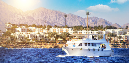 pleasure yacht anchored off the coast of the Egypt. Hot sunny day