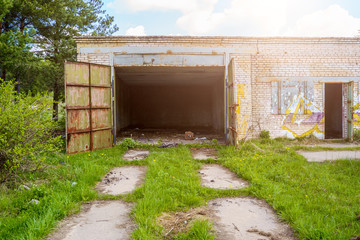 Photo of brick garage with open doors