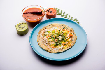 Egg Dosa is a popular south indian non-vegetarian breakfast or meal, served with sambar and chutney