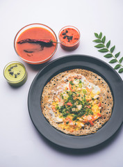 Egg Dosa is a popular south indian non-vegetarian breakfast or meal, served with sambar and chutney