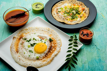 Egg Dosa is a popular south indian non-vegetarian breakfast or meal, served with sambar and chutney