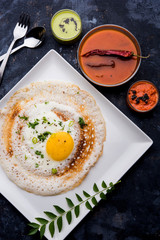 Egg Dosa is a popular south indian non-vegetarian breakfast or meal, served with sambar and chutney