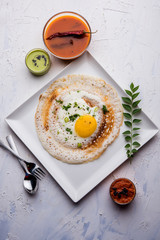 Egg Dosa is a popular south indian non-vegetarian breakfast or meal, served with sambar and chutney