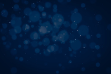 Abstract glitter bokeh on black background