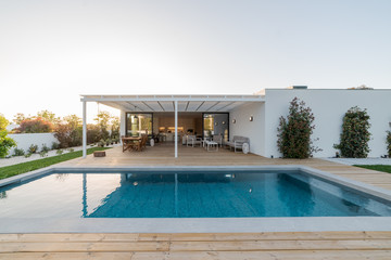 Modern villa with pool and garden - obrazy, fototapety, plakaty