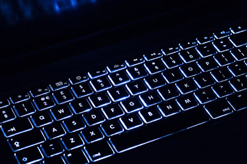 Blue light colour black keyboard with copy space