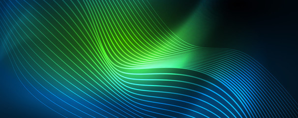 Smooth wave lines on blue neon color light background. Glowing abstract wave on dark, shiny motion, magic space light