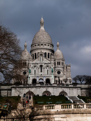 Fototapeta premium Paris, France, February 22, 2013: The Sacred Heart Basilica on the Montmartre hill in Paris in France
