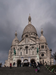 Fototapeta na wymiar Paris, France, February 22, 2013: The Sacred Heart Basilica on the Montmartre hill in Paris in France