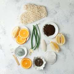 Homemade facial masks with natural ingredients for skincare - lemon, coffee bean, honey, aloe vera, oranges