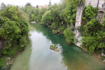 Naklejka na ściany i meble Natisone River on Cividale Town in Friuli Region in Northern Ita