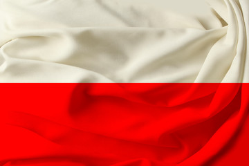 Obraz premium beautiful color Poland flag on pleated silk fabric