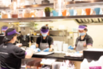 Abstract blur image of The chef is preparing to serve for background usage.