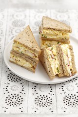Sandwiches with egg paste and red radishes