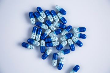 Pigment, tablet or pill. A collection of medicines and vitamins. Dietary supplementation