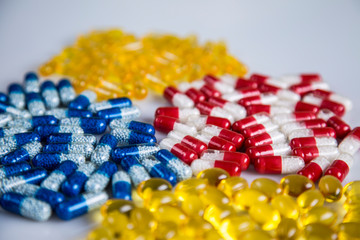 Pigment, tablet or pill. A collection of medicines and vitamins. Dietary supplementation