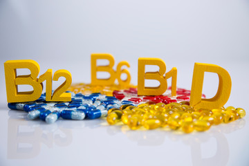 Pigment, tablet or pill. A collection of medicines and vitamins. Dietary supplementation