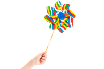 Child hold colorful pinwheel