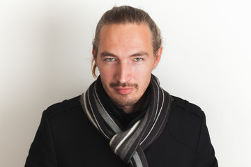 Obraz premium Young adult Asian man in black coat