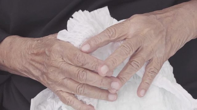 Elderly Woman Changing Diaper