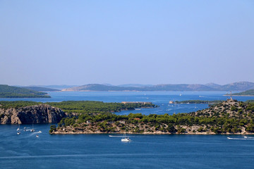 Fototapeta na wymiar Bay in Sibenik, Croatia with historic St. Nicholas' fortress.