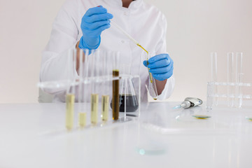 Fototapeta premium Experimental titration of the CBD oil in a glass tube