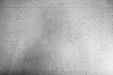 Brutal metallic texture background with scratches and dents