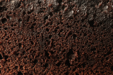 Fresh brownie as background, closeup. Delicious chocolate pie