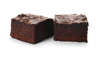 Pieces of fresh brownie on white background. Delicious chocolate pie