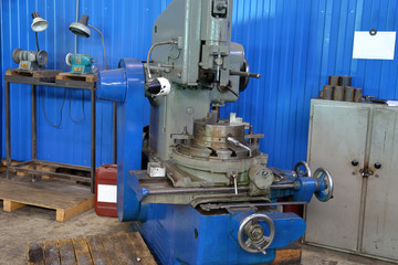Retro industrial machine for metalworking in the factory workshop