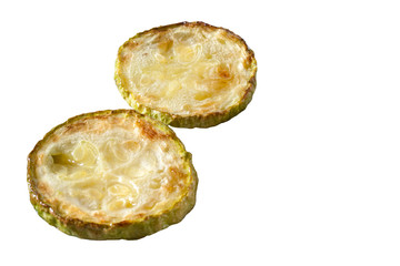 Fried several zucchini on a white background close-up.