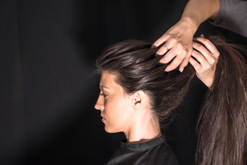 Fototapeta premium Woman getting her hair done in the salon