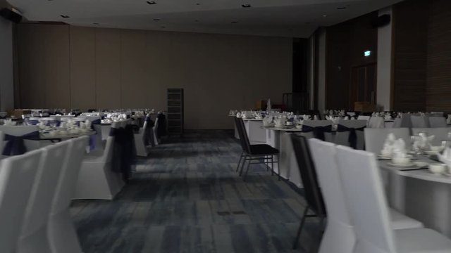 Serving, celebration, anniversary or wedding concept. Banqueting hall. Served tables.