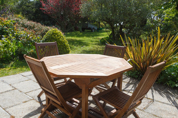 Terrace and wooden garden furniture during spring