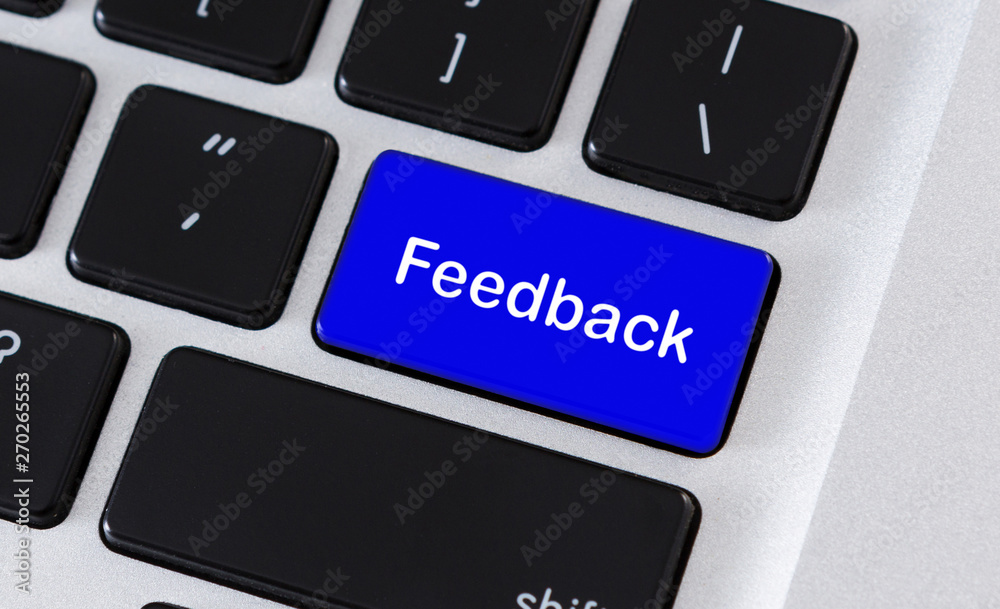 Poster blue computer key showing the word feedback