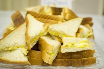Triangle cut egg salad sandwiches