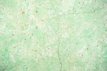 old painted cracked background, textured wall of green and beige colors