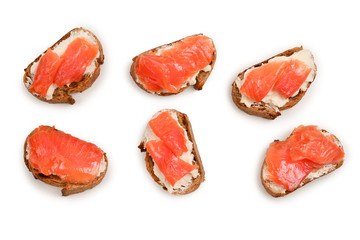 Salmon on a bread with cream isolated on white.