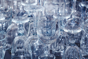 Lots of Clean empty wine glasses on table