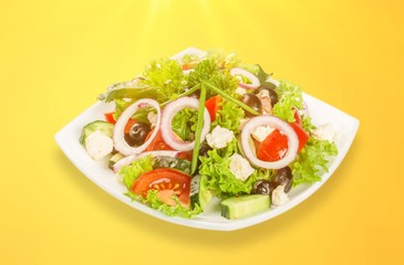 Fresh tasty vegetable salad in bowl on white background