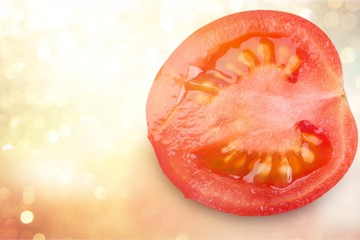 Tomato slice isolated on white background, top view