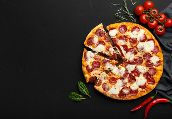 Fresh Pepperoni Pizza On Black Background With Free Space