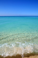 Wave Crashing on Tropical Beach