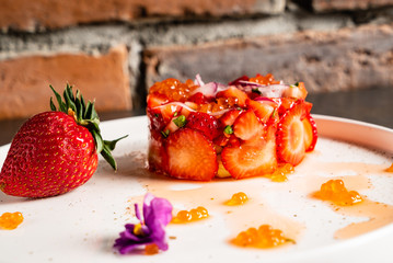 strawberry tartare with avocado and caviar