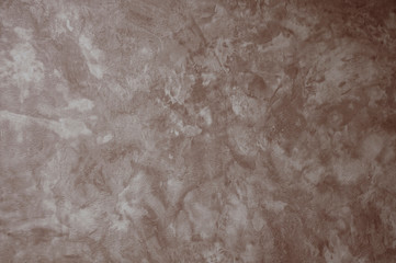 Textured textured gray uneven wall as a background with veins