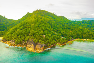 Aerial view of the tropical Mahe Island and beautiful lagoons