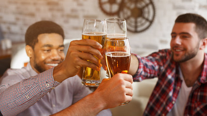 Happy Friends Clinking Beer Glasses, Celebrating Meeting