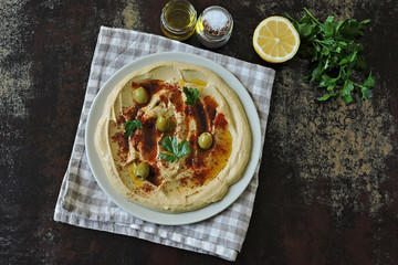 Fresh hummus with olive oil and spices.