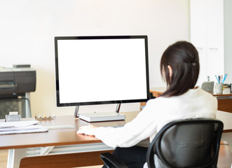 Fototapeta na wymiar Businesswoman Working On Computer in office