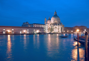Fototapeta na wymiar Illuminated church Santa Maria della Salute in Venice, Italy